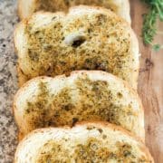 Garlic bread sourdough on cutting board